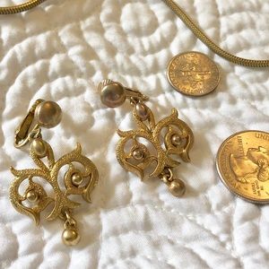 Golden metal clip on costume jewelry earrings